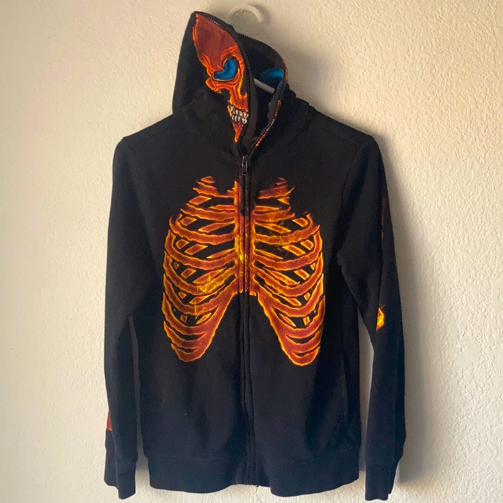 Zip up flaming skeleton hoodie for kids. Tony hawk size